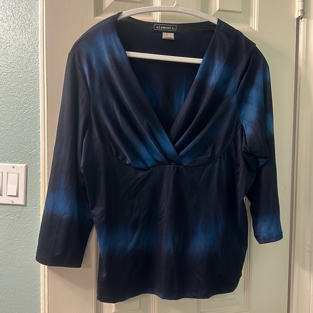 Blue top with various colors of blue